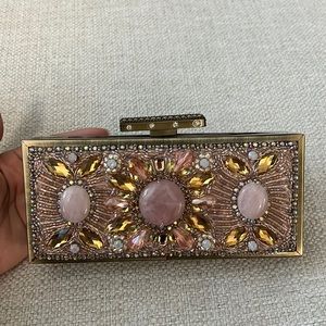 Rose gold clutch